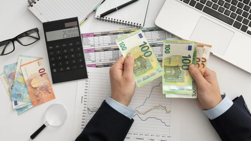 flat-lay-business-man-checking-finance-manners_23-2148793755